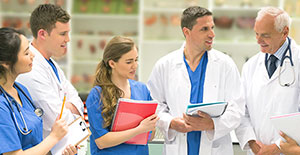 woman writing on flipchart paper