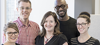 Five Health Quality Ontario employees posing for a picture