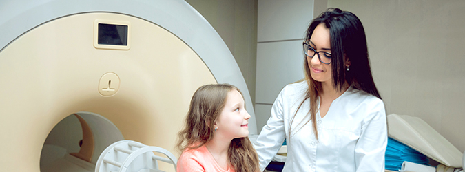 Young girl preparing for an MRI.