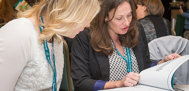 Participants reviewing documents