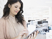  Woman looking for information on a tablet