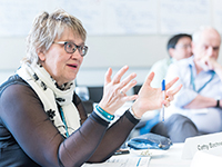 Woman sharing her ideas during a discussion